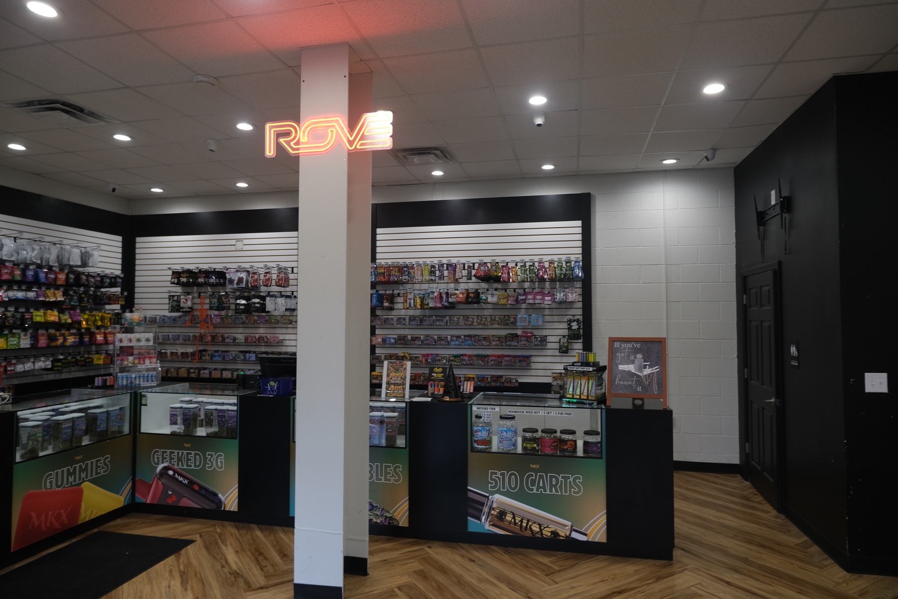 Inside District Green, with the Rove sign above the product displays